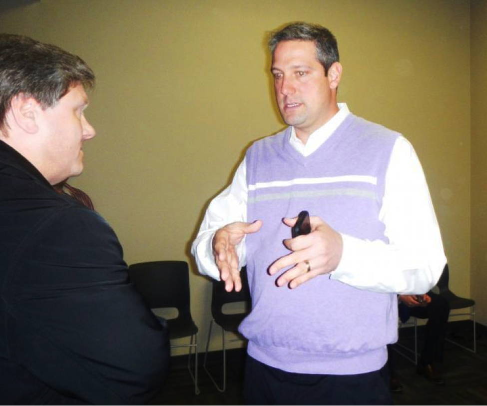 Congressman Tim Ryan is pictured here talking to a constituent. In an interview with BPR, Ryan said that he enjoys the ability of social media to “meet the people where they’re at” via Twitter and Facebook, platforms that simulate the humanistic characteristic of face-to-face interactions like these.